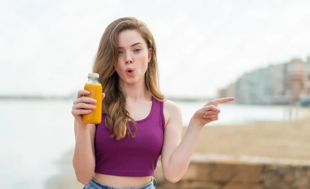 Emmy with a bottle of juice