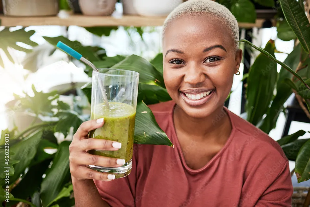 Lady with a glass of delicious healthy drink